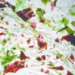 UROBOROS - CRYSTAL CLEAR,WITH LEAF GREEN,RED,AND PINK FRACTURES AND GREEN STREAMERS