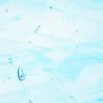 WISSMACH - Prisma Glass - CRYSTAL BASE WITH SEA BLUE STREAKS Fusible COE 96