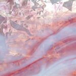 UROBOROS - CRYSTAL CLEAR AND WISPY WHITE RING MOTTLE OPAL WITH PINK STREAKS