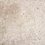 Uroboros - 96 frit - Coarse metallic irid on clear