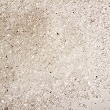 Uroboros - 96 frit - Coarse metallic irid on clear